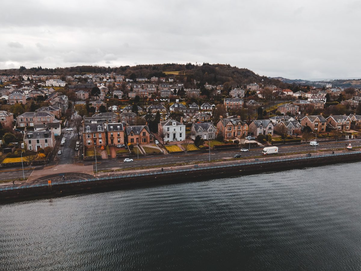 Town rooftops and river from above