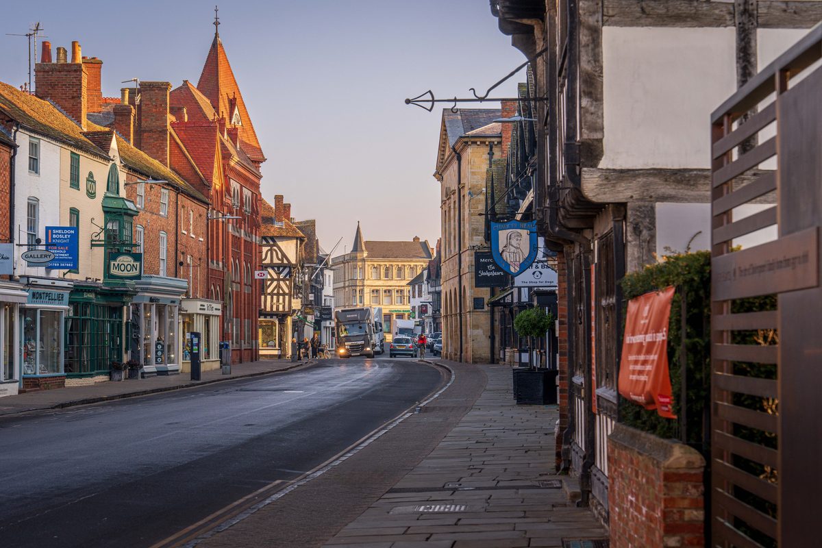 Historic high street with brick and timber buildings